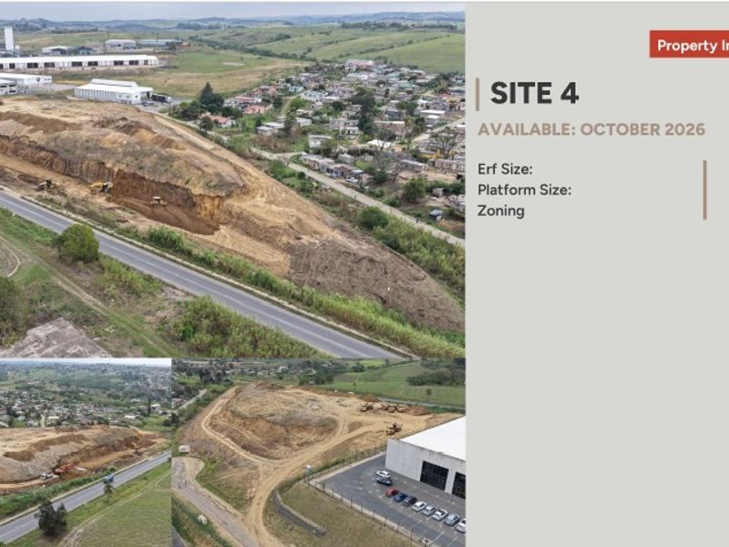 Aerial view of an industrial development site showing earthworks and surrounding infrastructure.