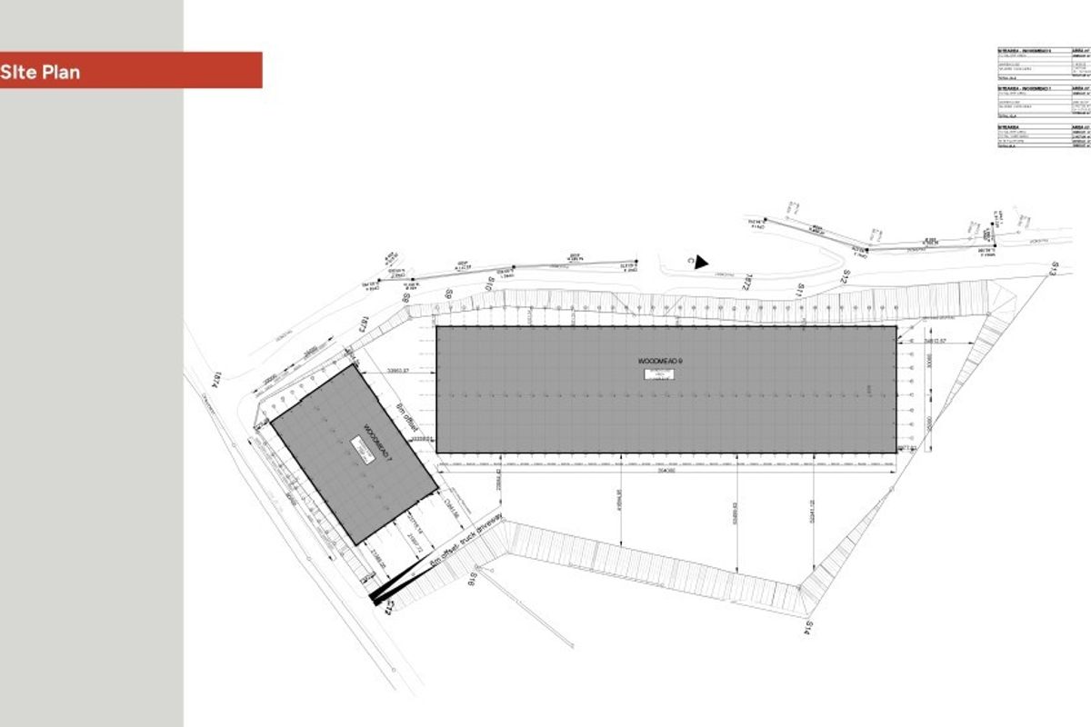 A detailed site plan illustrating the layout of industrial buildings and truck driveway access on the property.