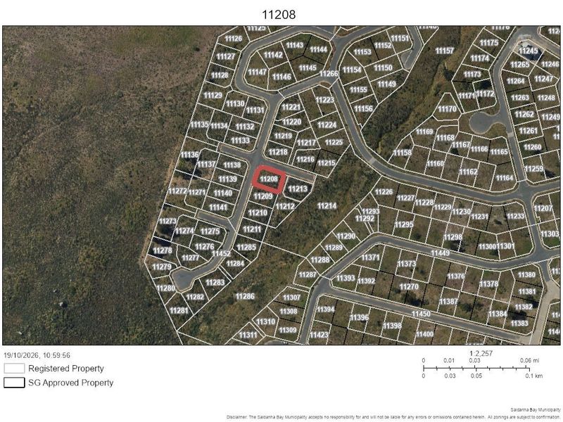 An aerial cadastral map showing the layout of residential land parcels and road infrastructure within the development area.