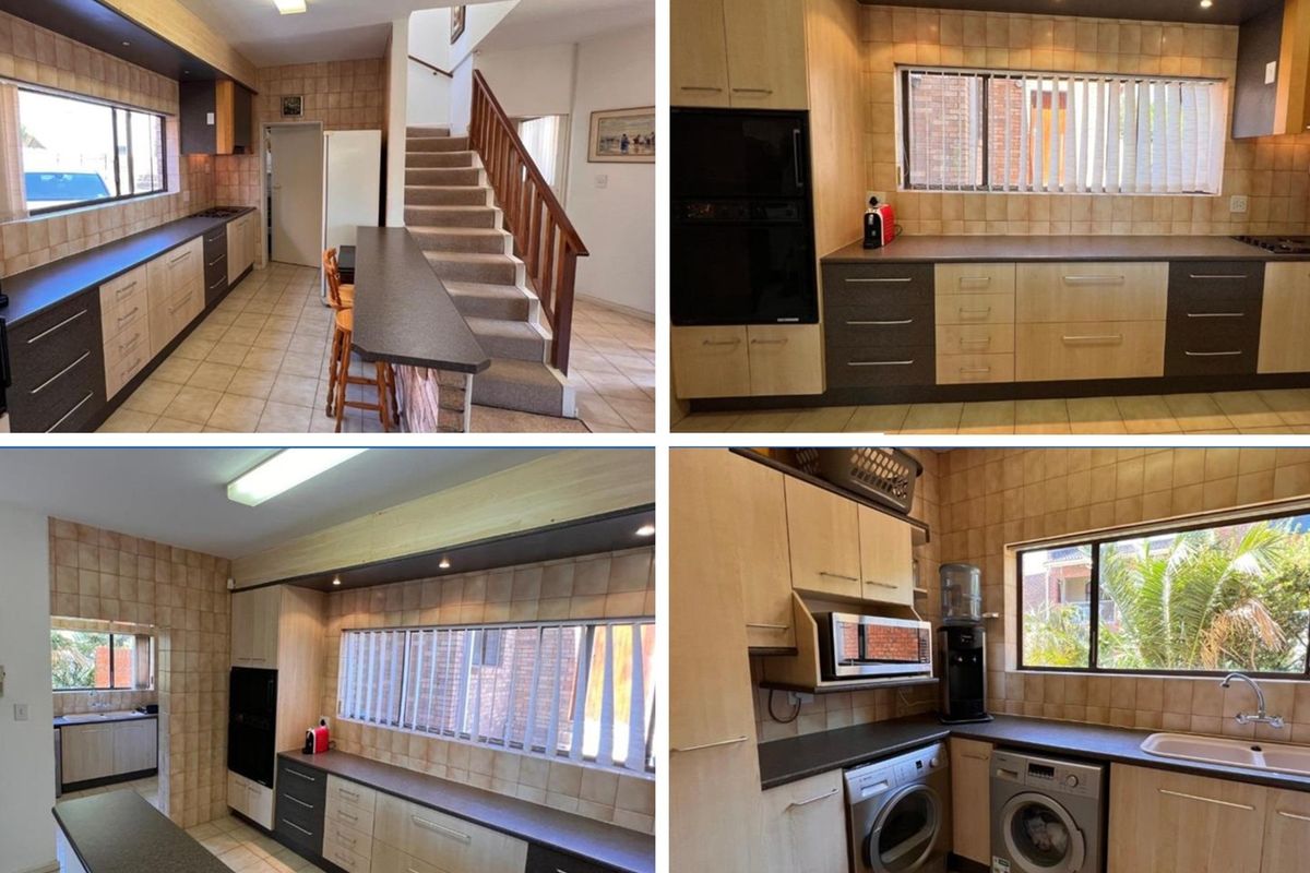 A functional kitchen featuring built-in cabinetry, tiled backsplash, and integrated appliances, with an adjacent staircase leading to the upper level.