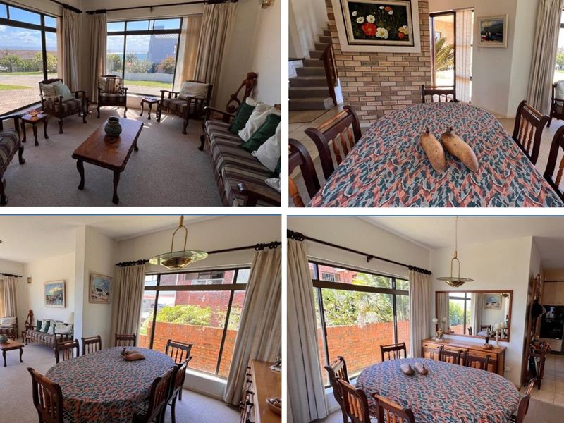 Spacious open-plan living and dining area featuring large windows, a brick feature wall, and a staircase, offering a bright and functional layout.