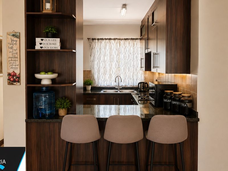 A well-maintained kitchen featuring dark wood cabinetry, granite countertops, a breakfast bar, and integrated under-cabinet lighting.