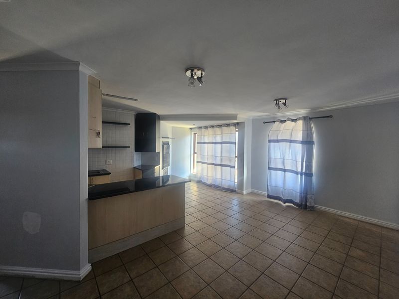 Secure 3-bedroom And 2-bathroom Apartment In Table View - Photo 6