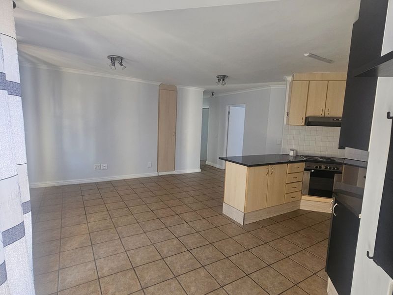 Secure 3-bedroom And 2-bathroom Apartment In Table View - Photo 3