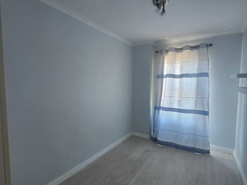 Secure 3-bedroom And 2-bathroom Apartment In Table View - Photo 10