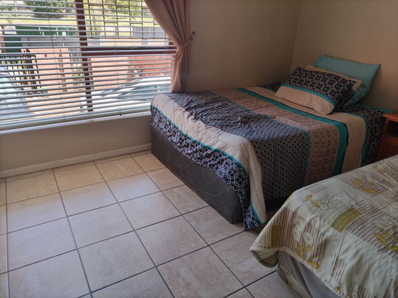 Secure 2-Bedroom House Nestled In The Safe And Serene Heatherlands Neighborhood - Photo 8