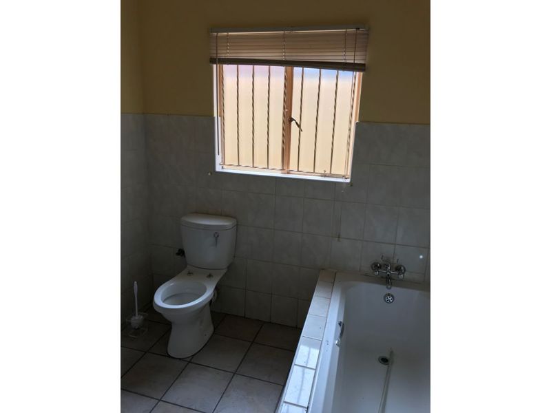 Open Plan Kitchen Combined With Dining & Lounge, Complete With Ensuite Main Bedroom Plus Bathroom And Two Bedrooms At  Diepkloof Zone 5 - - Photo 10