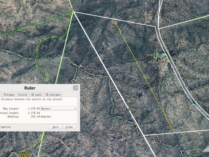 Aerial satellite view of the residential land parcel showing property boundaries, borehole location, and site measurements.