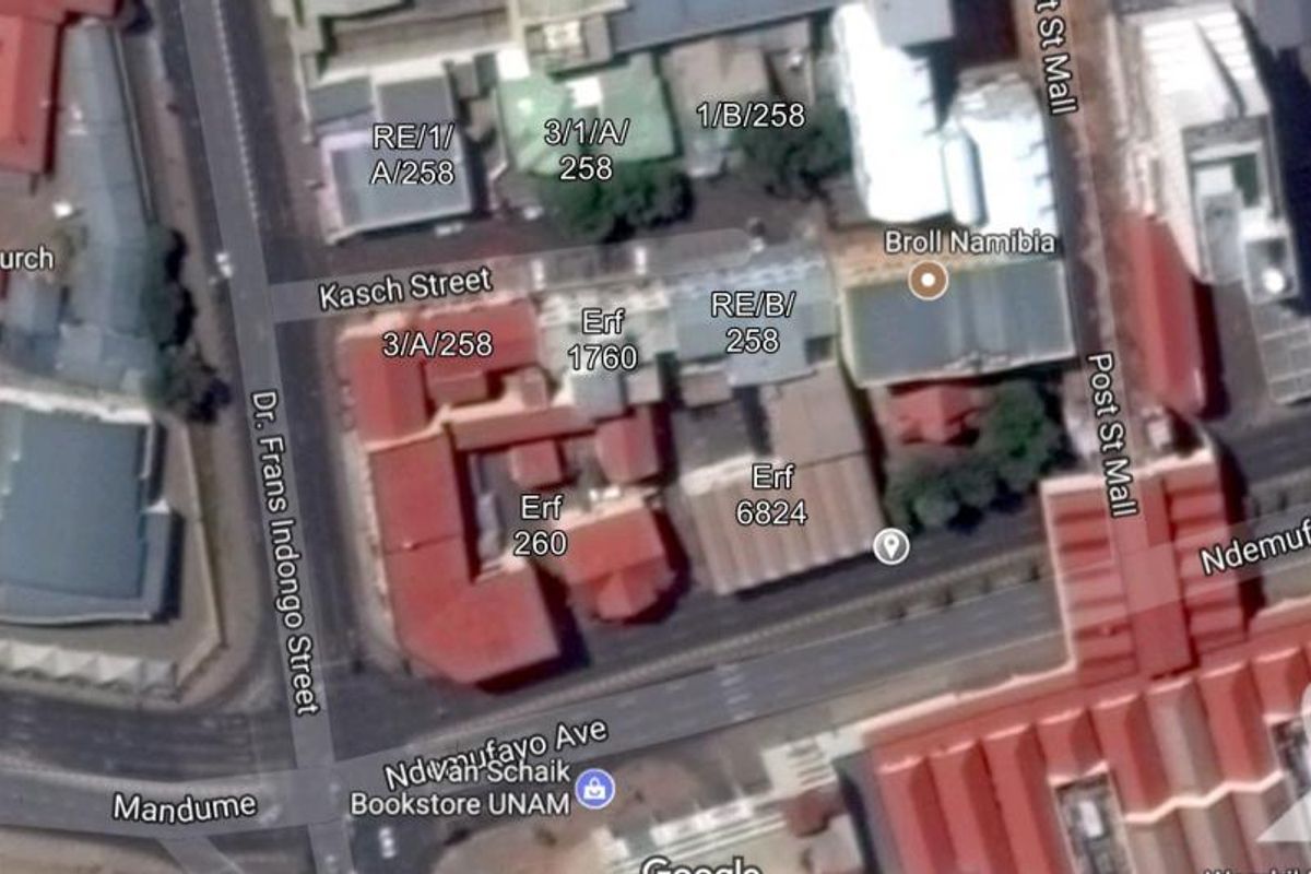An aerial satellite view showing the urban layout and commercial building positioning near Kasch Street and Ndemufayo Avenue.