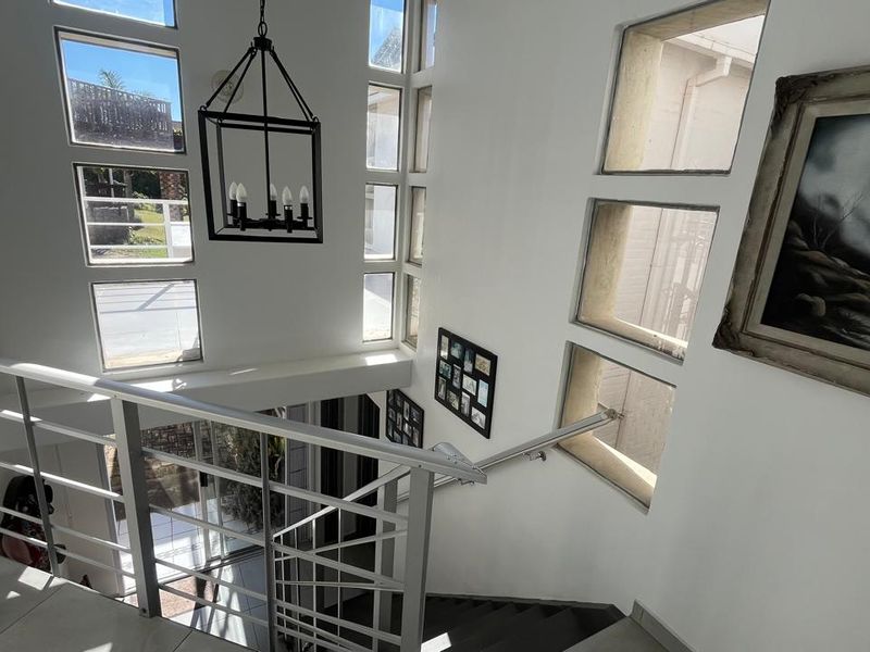 Versatile Double-Story Home with Solar Power Flatlet Potential and Dual Plot Access - Photo 10