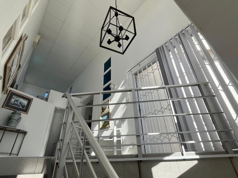 Versatile Double-Story Home with Solar Power Flatlet Potential and Dual Plot Access - Photo 9