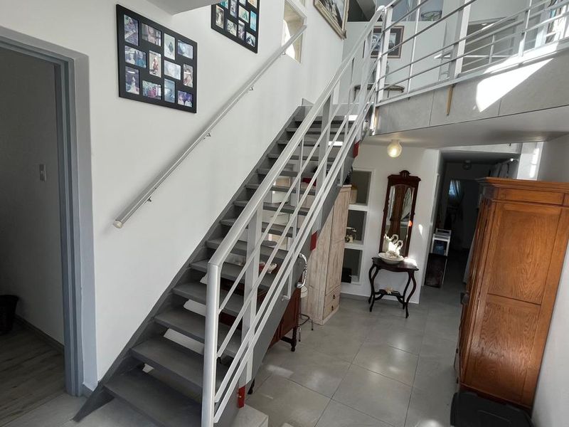 Versatile Double-Story Home with Solar Power Flatlet Potential and Dual Plot Access - Photo 8