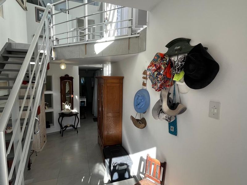 Versatile Double-Story Home with Solar Power Flatlet Potential and Dual Plot Access - Photo 7