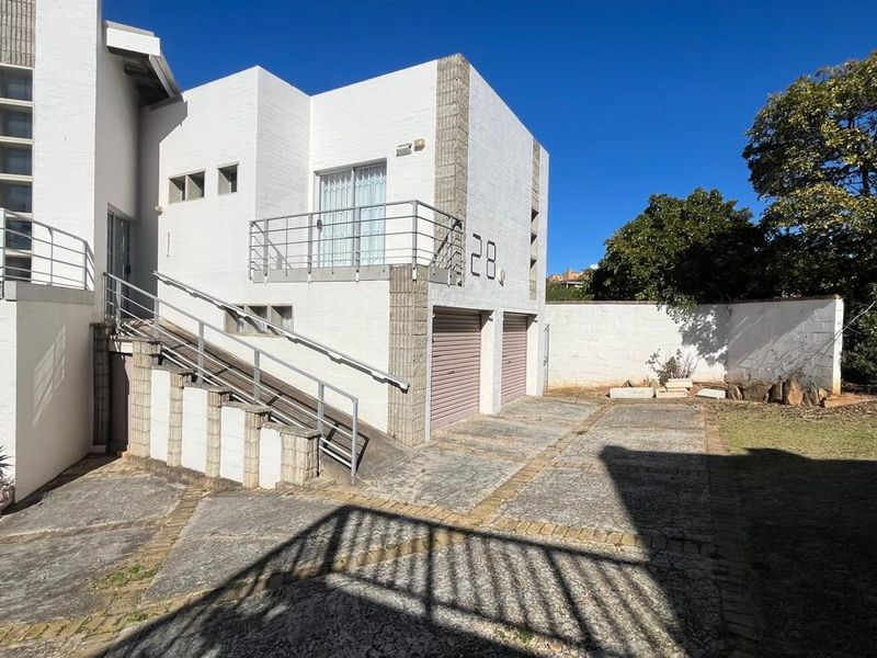 Versatile Double-Story Home with Solar Power Flatlet Potential and Dual Plot Access - Photo 2