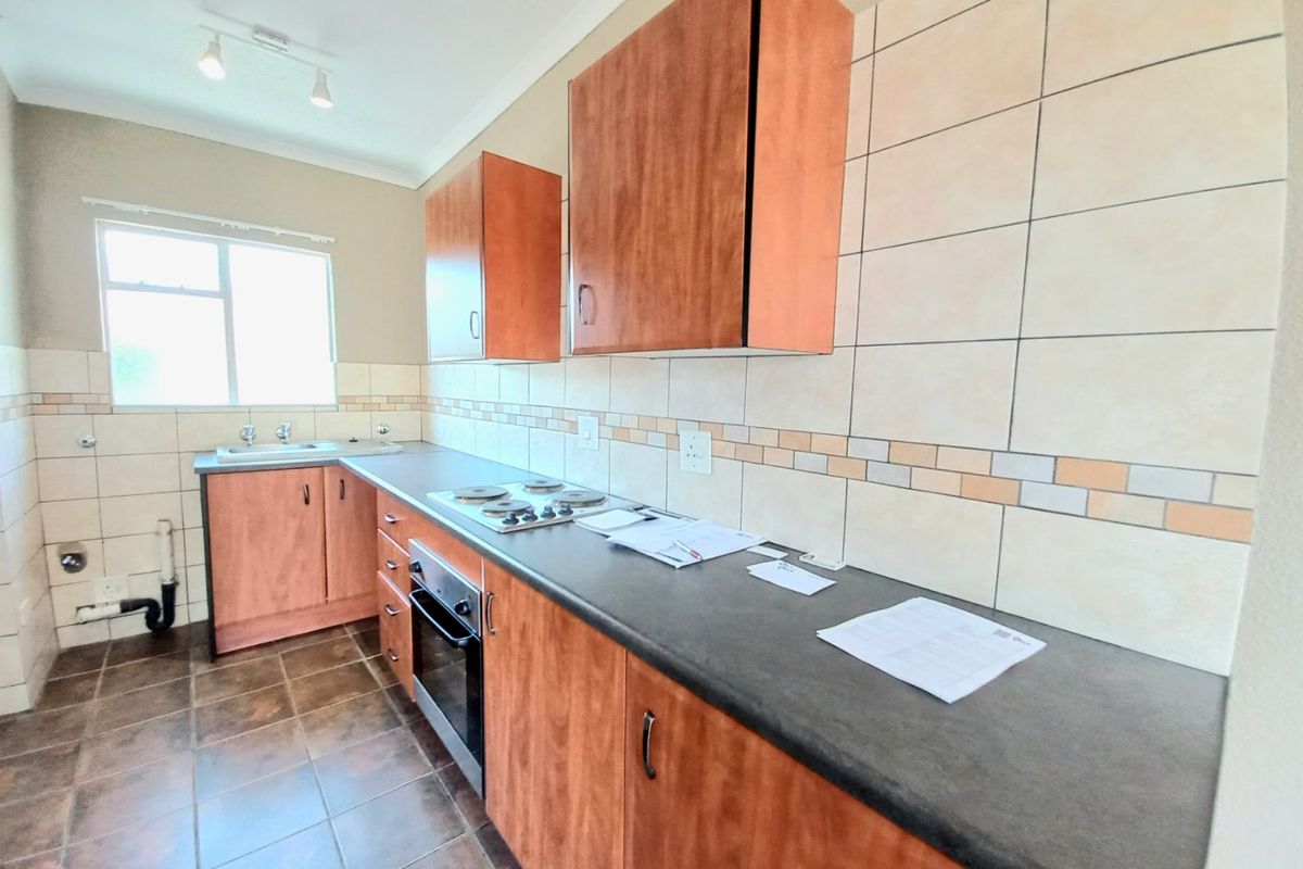 Charming 1-Bedroom Upstairs Unit in a Secure Lifestyle Estate with Excellent Amenities! - Photo 5