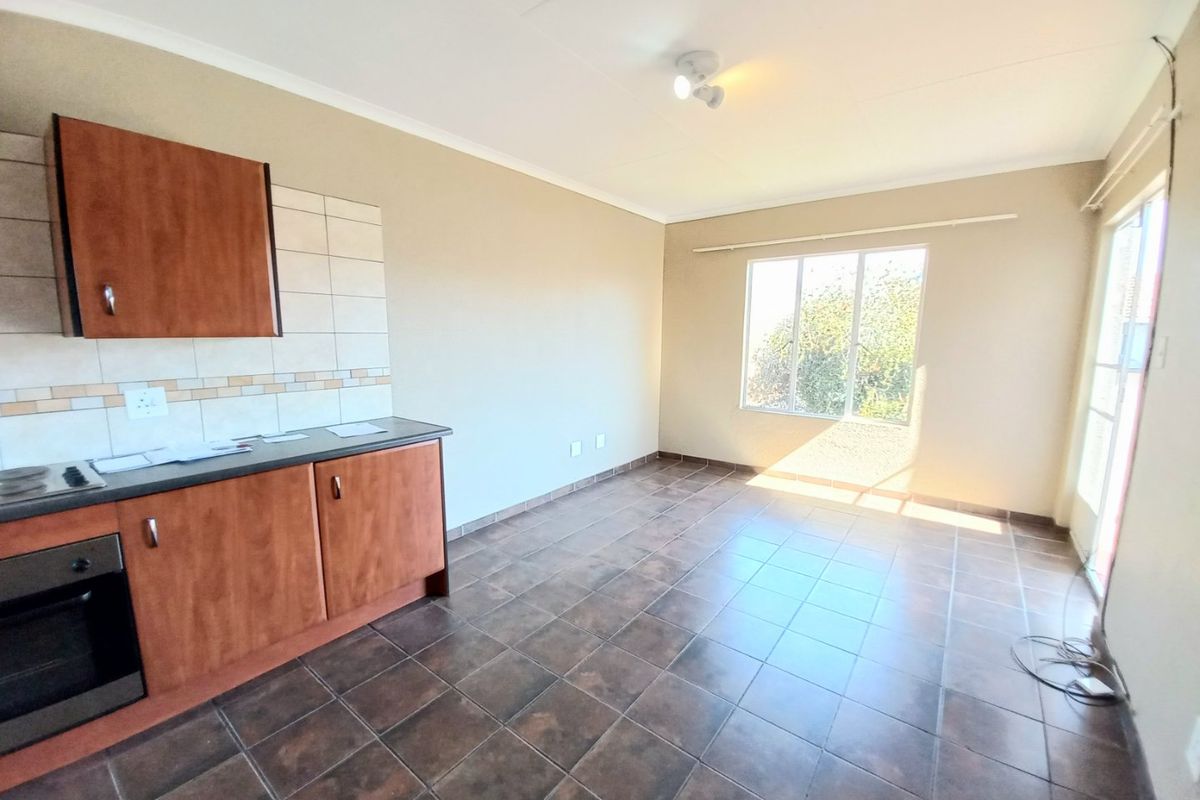 Charming 1-Bedroom Upstairs Unit in a Secure Lifestyle Estate with Excellent Amenities! - Photo 4