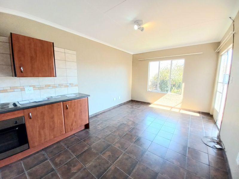 Charming 1-Bedroom Upstairs Unit in a Secure Lifestyle Estate with Excellent Amenities! - Photo 4