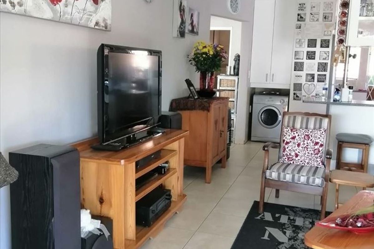 Compact Two-Bedroom Home with Functional Layout - Photo 2