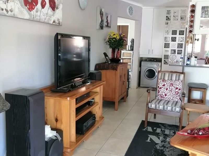 Compact Two-Bedroom Home with Functional Layout - Photo 2