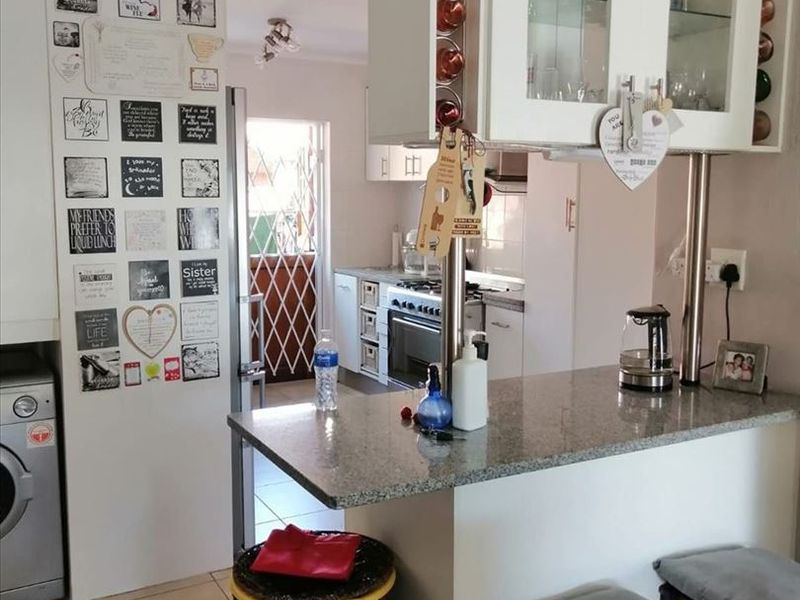 Compact Two-Bedroom Home with Functional Layout - Photo 1