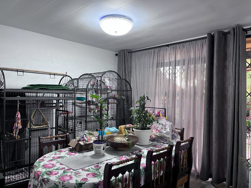 Charming Double-Storey Facebrick Townhouse with Private Garden - Photo 6