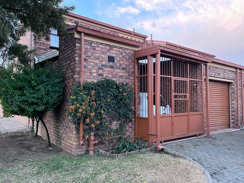 Charming Double-Storey Facebrick Townhouse with Private Garden - Photo 3