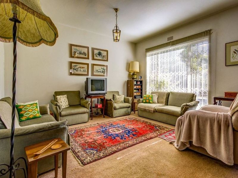 Comfortable Family Home with Garage and Carport - Photo 2