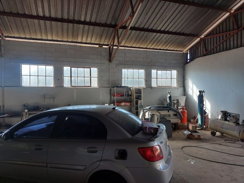 Large Storage / Workshop to Rent – Safe & Secure on a Plot!  Looking for the perfect space to run your business or store equipment? This spacious storage unit or workshop is now available to rent on a safe and secure plot, offering everything you need for smooth operations.  Property Features: Large Storage / Workshop Area – Ideal for business use or equipment storage Three-Phase Electricity – Perfect for heavy-duty machinery Water & Electricity Included in the Rent – No extra monthly surprises Situated on a Secure Plot – Peace of mind for your assets Easy Access for trucks or large vehicles  Perfect for tradesmen, small business owners, or anyone needing reliable space in a secure environment.  Contact us today to arrange a viewing and secure this versatile space!  Space like this doesn’t stay available for long – act fast - Photo 5