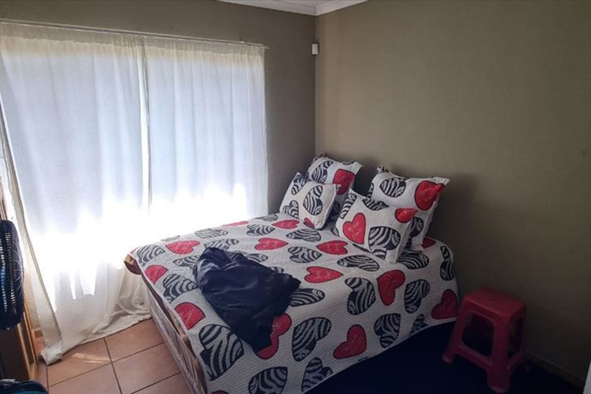 Neat and Functional Home with Double Garage and Pool - Photo 3