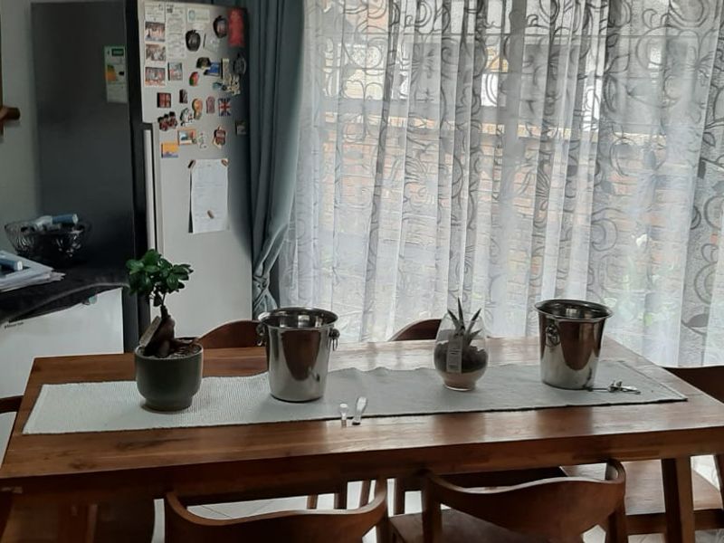 Neat and Functional Home with Double Garage and Pool - Photo 8