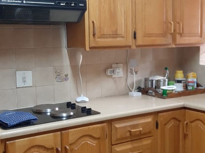 Neat and Functional Home with Double Garage and Pool - Photo 7