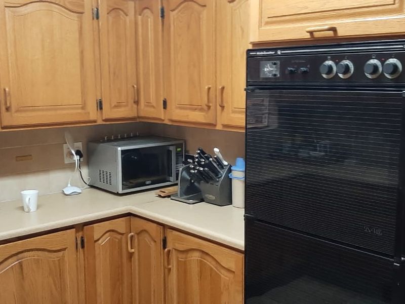 Neat and Functional Home with Double Garage and Pool - Photo 6