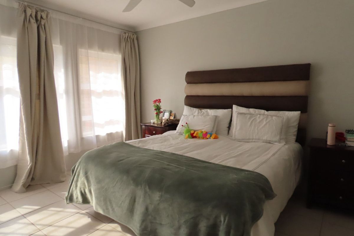 This 4-bedroom, 3-bathroom home in the sought-after, secure complex of Highway Gardens is designed for families who value both comfort and lifestyle:. - Photo 4