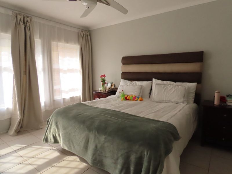 This 4-bedroom, 3-bathroom home in the sought-after, secure complex of Highway Gardens is designed for families who value both comfort and lifestyle:. - Photo 4