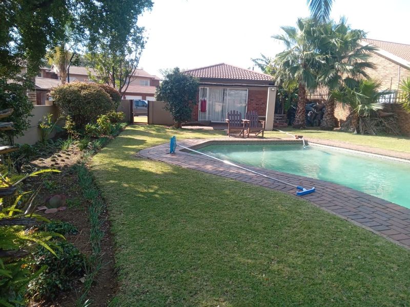 This 4-bedroom, 3-bathroom home in the sought-after, secure complex of Highway Gardens is designed for families who value both comfort and lifestyle:. - Photo 7