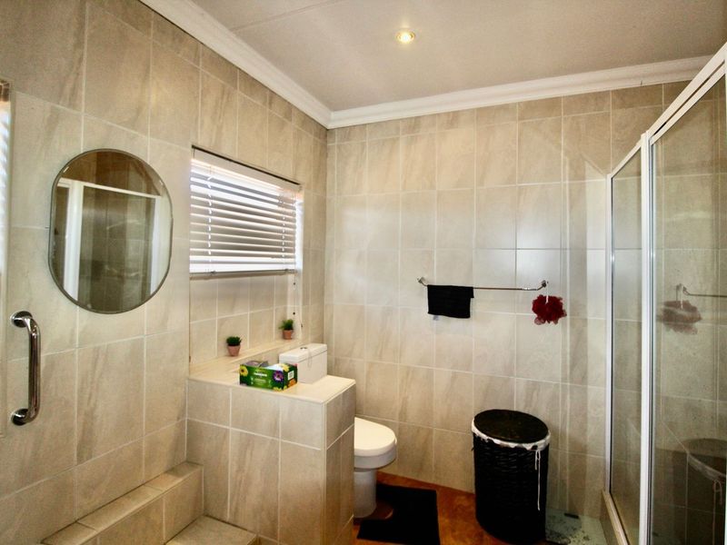 This 4-bedroom, 3-bathroom home in the sought-after, secure complex of Highway Gardens is designed for families who value both comfort and lifestyle:. - Photo 6