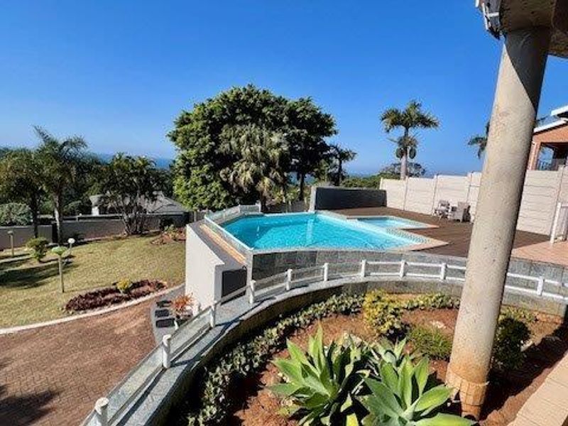 Coastal Luxury Redefined – Elegant Multi-Level Family Home with Ocean Views - Photo 5