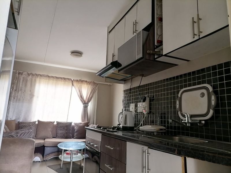 Two bedrooms Townhouse available for Sale at Fleurhof, Zambezi Road, Johannesburg - Photo 2