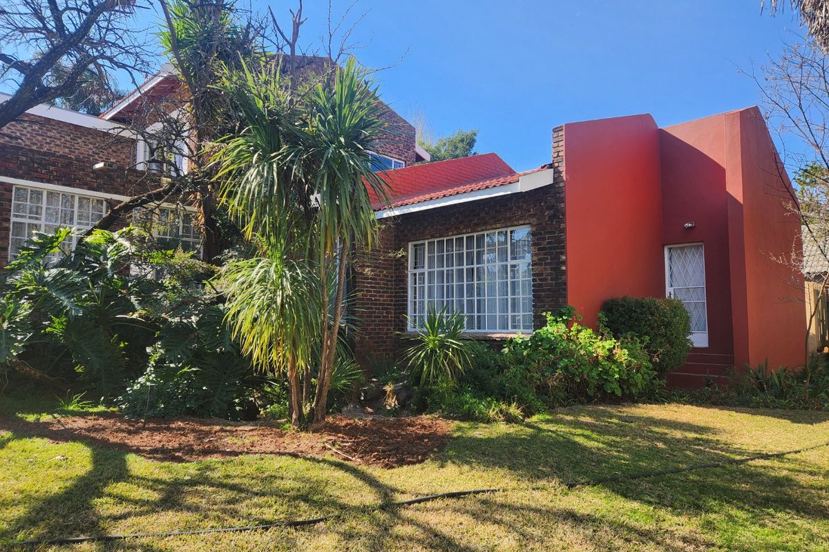 A Solid, Well-Loved Family Home with Space, Comfort, and a Pool for the Warmer Months - Photo 4