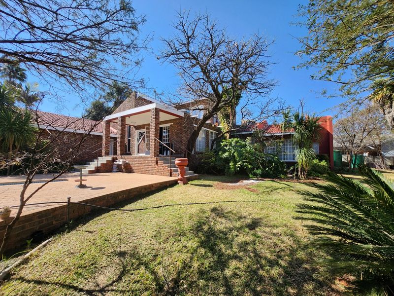 A Solid, Well-Loved Family Home with Space, Comfort, and a Pool for the Warmer Months - Photo 5