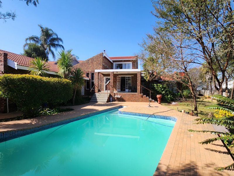 A Solid, Well-Loved Family Home with Space, Comfort, and a Pool for the Warmer Months - Photo 3