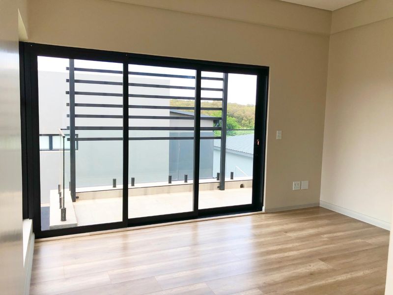 Contemporary 3-Bedroom Home | Entertainment Patio & Spacious Garden | Brand-New Build - Photo 10