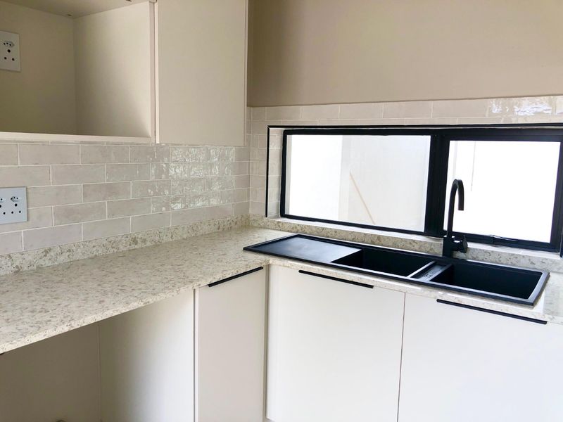 Contemporary 3-Bedroom Home | Entertainment Patio & Spacious Garden | Brand-New Build - Photo 8