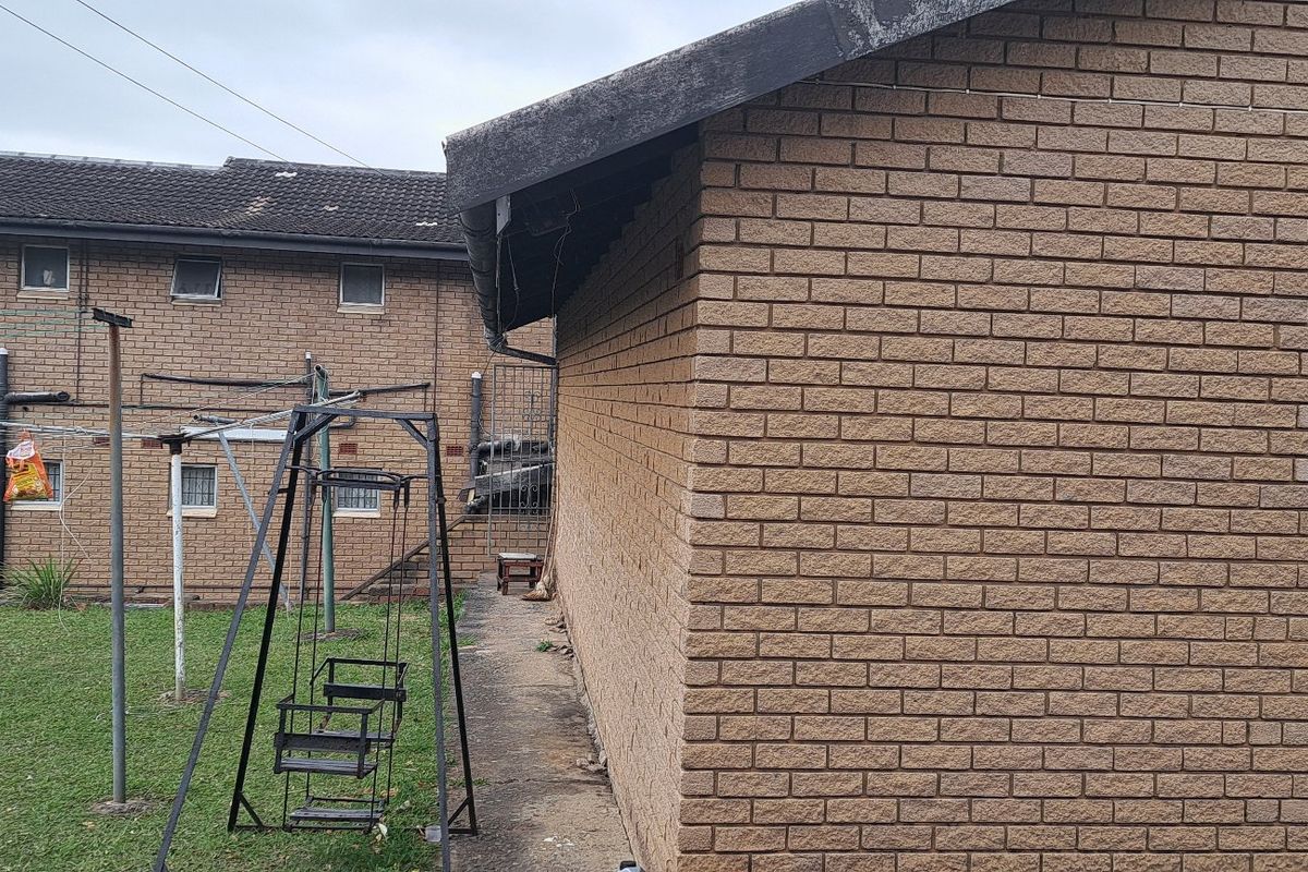 7-Bedroom Home with Exceptional Potential in Prime Reservoir Hills - Photo 5