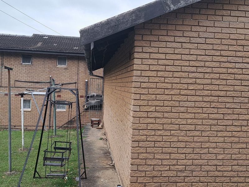 7-Bedroom Home with Exceptional Potential in Prime Reservoir Hills - Photo 5