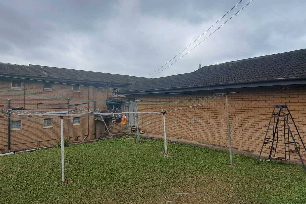 7-Bedroom Home with Exceptional Potential in Prime Reservoir Hills - Photo 3