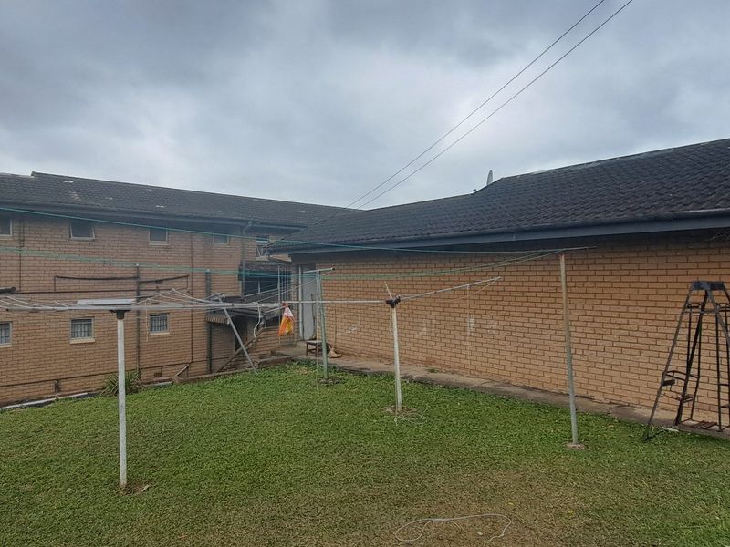 7-Bedroom Home with Exceptional Potential in Prime Reservoir Hills - Photo 3