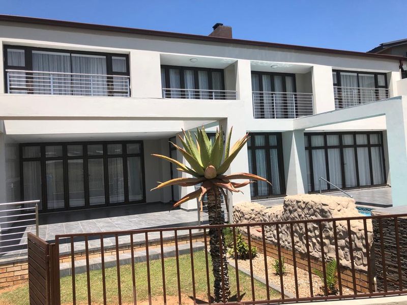 Luxurious Ultra-Modern 5-Bedroom Home with Pool & Premium Finishes - Photo 6