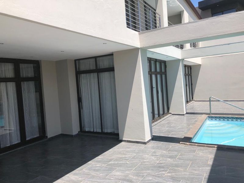 Luxurious Ultra-Modern 5-Bedroom Home with Pool & Premium Finishes - Photo 10