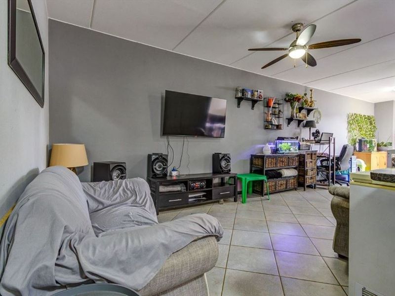 Charming Family Home with Spacious Living Areas - Photo 2